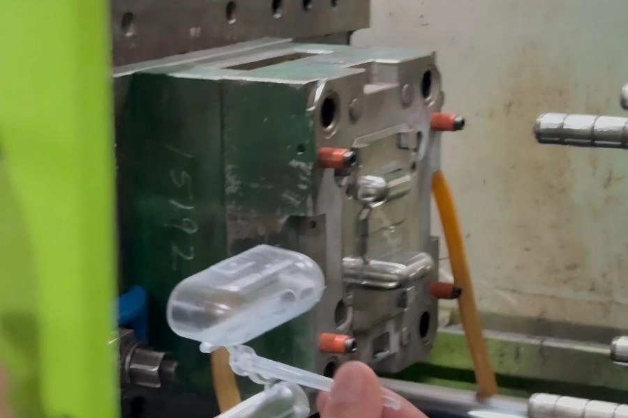 Injection mold trial with molded sample review